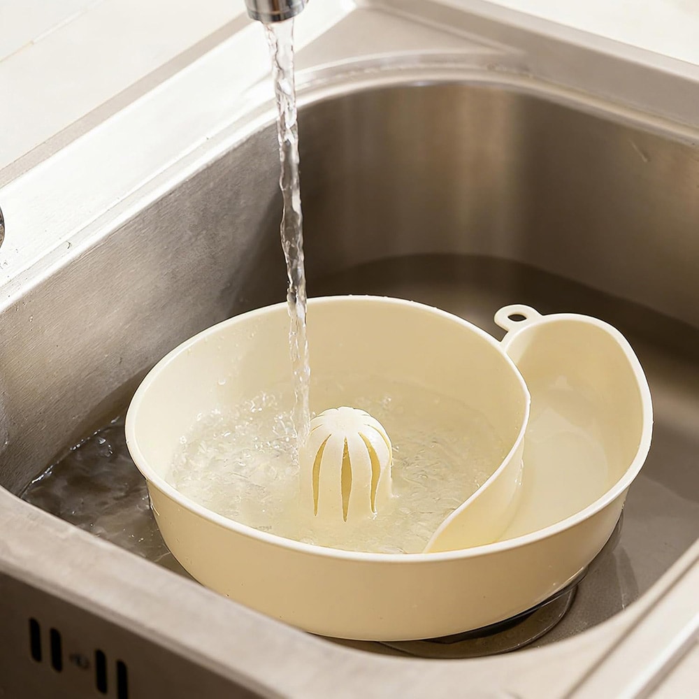 Snegleformet dørslag for frukt og grønnsaker