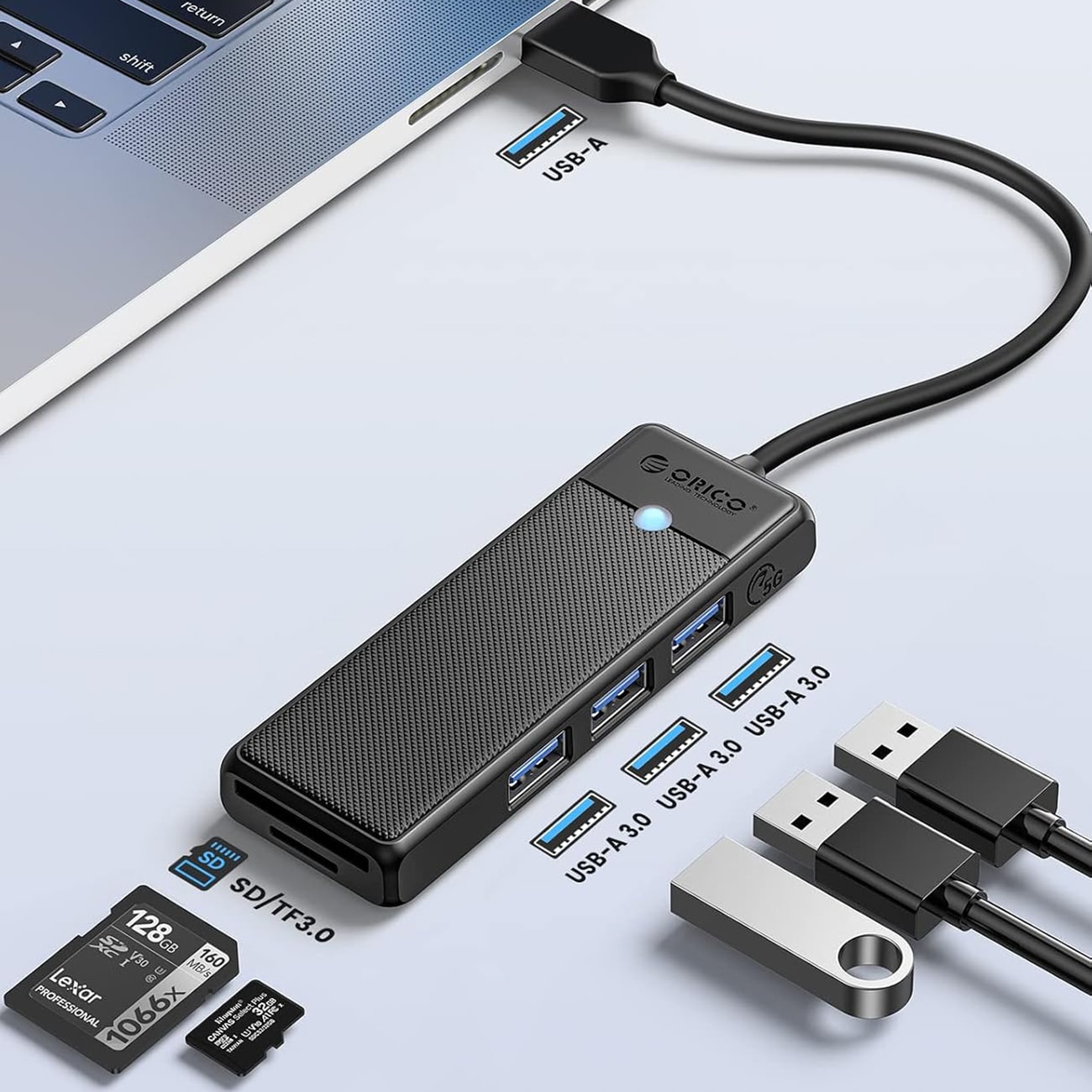 Orico PAPW3AT-U3 USB-hub med 4 porter (3x USB-A 3.0) og microSD/SD-kortleser, 1 m – svart