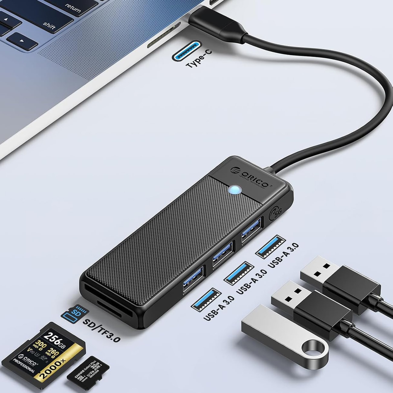 Orico PAPW3AT-C3 USB-hub med 4 porter (3x USB-A 3.0) og microSD-/SD-kortleser, 0,15 m – svart